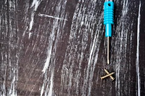 Screwdrivers to repair lying on the table. Men's housework. Fix Stock Photos