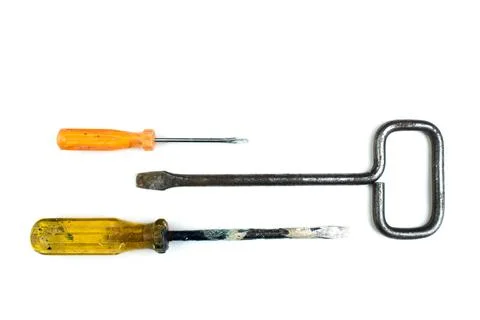Screwdrivers on white background. Tools. Top view. Stock Photos