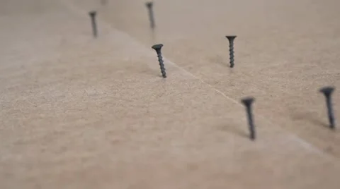 Screwes at row Video stock 41087813