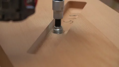 Screwing a Bolt into a Thread in Workshop Vídeos de archivo 293541815