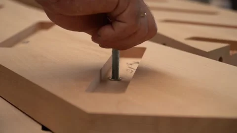 Screwing a Bolt into a Thread in Workshop Video stock 293541821