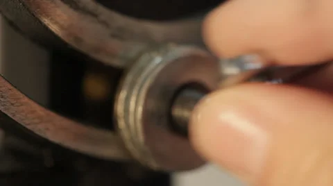 Screwing of butterfly nut Stock Footage 35911336