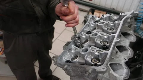 Screwing the car engine head with a key, close-up Stock Footage 150266693