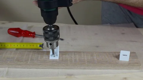 Screwing with an electric drill Stock Footage 75419237