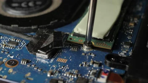 Screwing In M.2 hard drive Computer Macro (2) Stock Footage 237025284