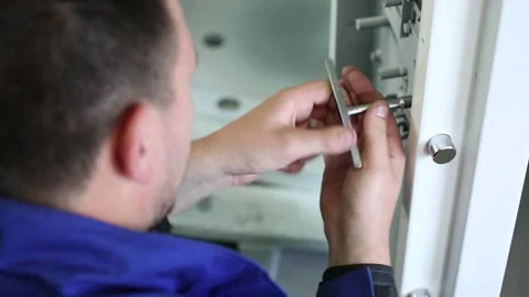 Screwing of a nut in a safe lock Stock Footage 94562836