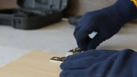 Screwing a screw with electric screwdriver. Stock Footage 83164610