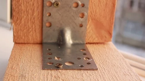 Screwing the screw with a screwdriver Stock Footage 107407822