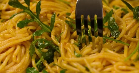 Screwing spaghetti on fork Top view Closeup 4k Stock Footage 104061572