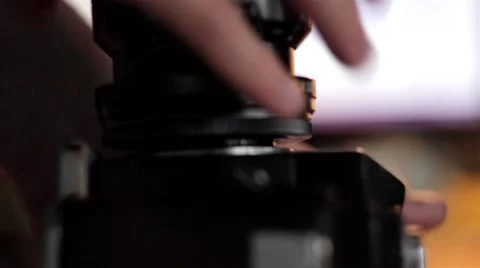 Screwing In a Vintage Camera Lens Stock Footage 51363697