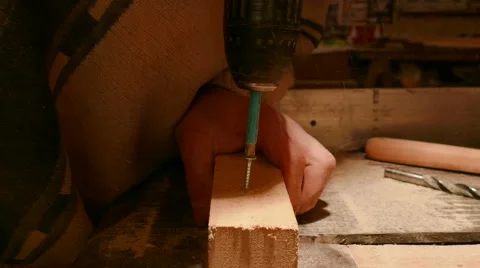 Screwing Into Wood Stockbeeldmateriaal 58687257