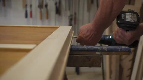 Screwing in a woodworking workshop 스톡 동영상 227857435