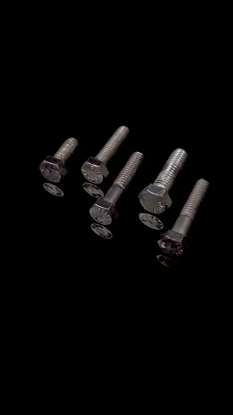 Screws on Black Background Stock Footage 293498121