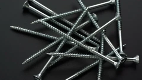 Screws on black background with reflection Stock Footage 150863600