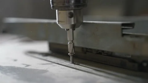 Screws the bolt into the wood Video stock 162167680