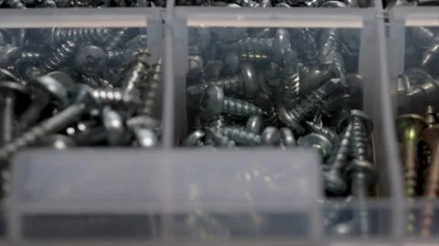 Screws of different sizes hardware fasteners close up. Stock Footage 245399617