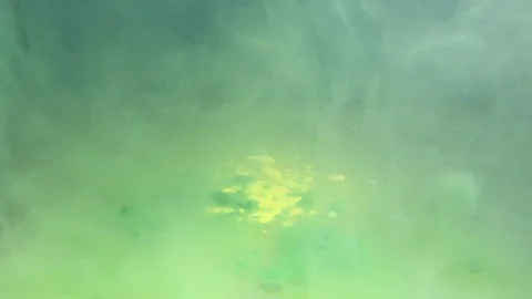 Screws fall into the water Stock Footage 119078614