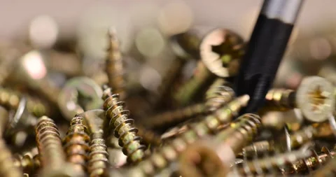Screws for fastening are used in construction, screws with a beautiful color for Stock Footage 299562884