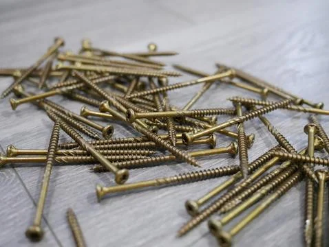 Screws on the floor Stock Photos