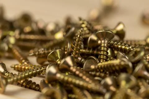 Screws for installation and construction work with wood, yellow metal self ta Stock Photos