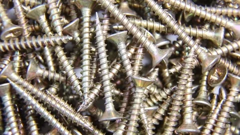 Screws for macro video, screw background. Steel screws rotate. Screws for wood. Stock Footage 167917236