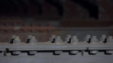 Screws, nuts, bolts, screws. Twisted. Rails, how to get there Stock Footage 101892482