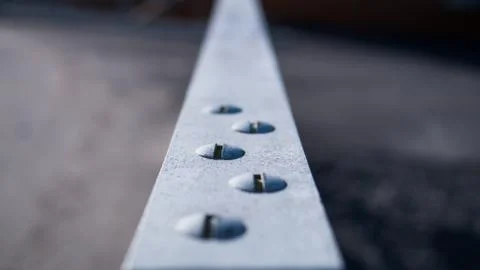 Screws on a railing, metal construction Stock Photos