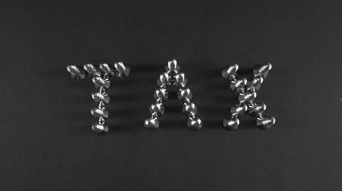 Screws showing the word of tax. Stock Footage 62012453