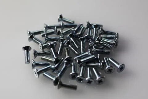 Screws on the table Stock Photos