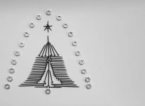 Screws for a tree in the form of a Christmas tree Stock Photos