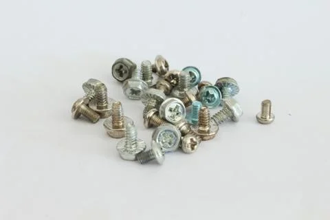 Screws used to mount devices on a computer. Stock Photos