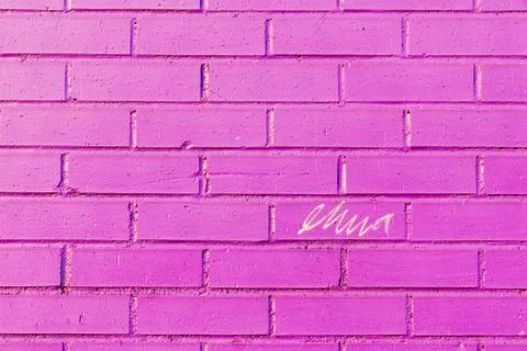 Scribble on a bricked wall Stock Photos