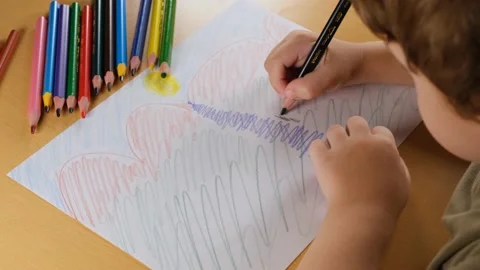 The scribbling boy Stock Footage 222744799
