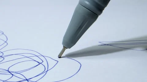 Scribbling on paper with pen closeup Stock Footage 278210778