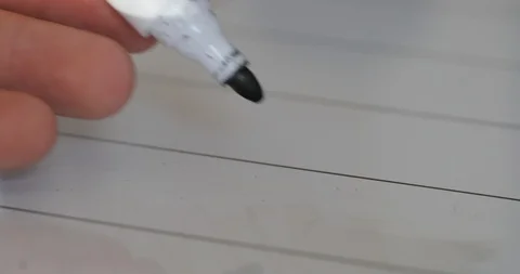 Scribbling on a white board in black pen Stock Footage 92453310
