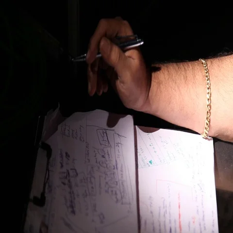 Script and files in the hand Stock Footage 69470366