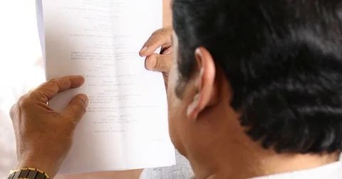 Script and files in the hand Stock Footage 74286752