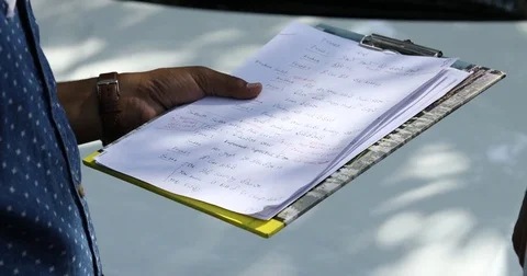 Script and files in the hand Stock Footage 74505191