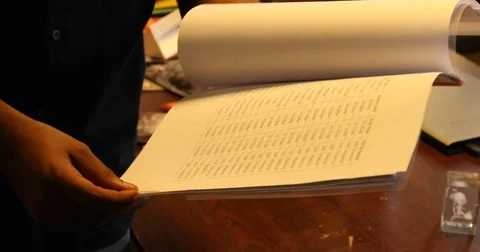 Script and files in the hand Stock Footage 75965670