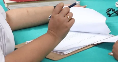 Script and files in the hand Stock Footage 83756474