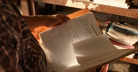 Script and files in the hand Stock Footage 83770895