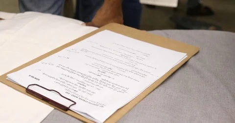 Script and files in the hand Stock Footage 83789201