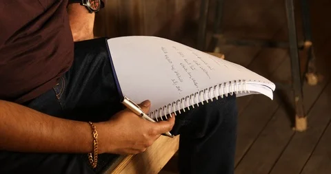 Script and files in the hand Stock Footage 86889130