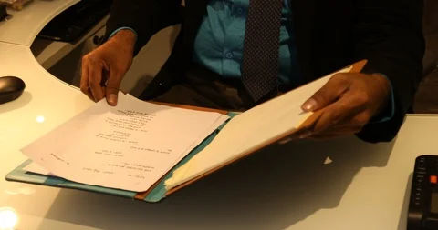 Script and files in the hand Stock Footage 108425146