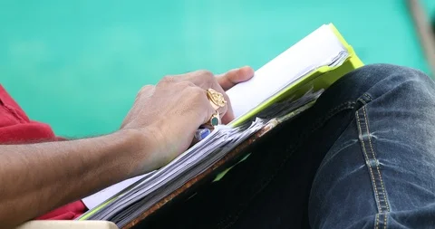 Script and files in the hand Stock Footage 115126584