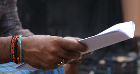 Script and files in the hand Stock Footage 144689649