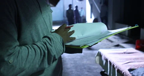 Script and files in the hand Stock Footage 144748798