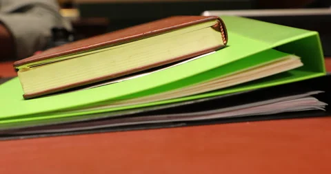 Script and files on table Stock Footage 283320385