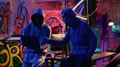 Script kiddie helped by hacker Stock Footage 256112915