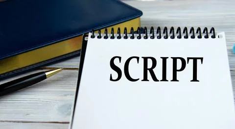 SCRIPT - word in a notebook on the background of a weekly and a pen. Stock Photos